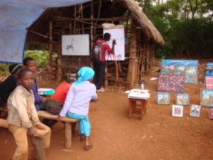 Children learn how to draw and paint at village art school.